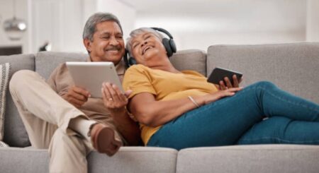 Seniors enjoying online entertainment